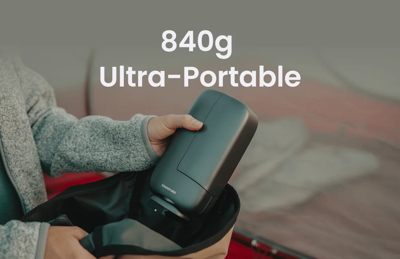 A person packing the ultra-portable 840g DWARF mini